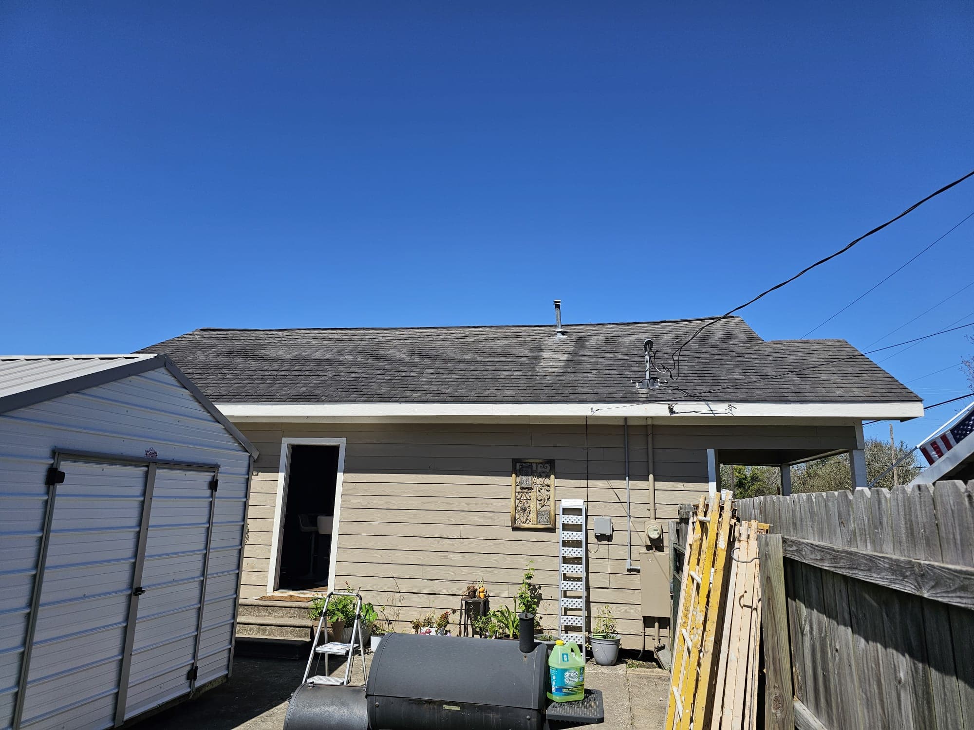 Real aged asphalt roof in Katy, TX before Roof Rejoov bio-oil treatment